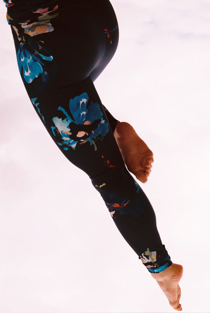 super comfortable yoga legging made fro recycled materials with hand-painted flowers printed on the fabric. 