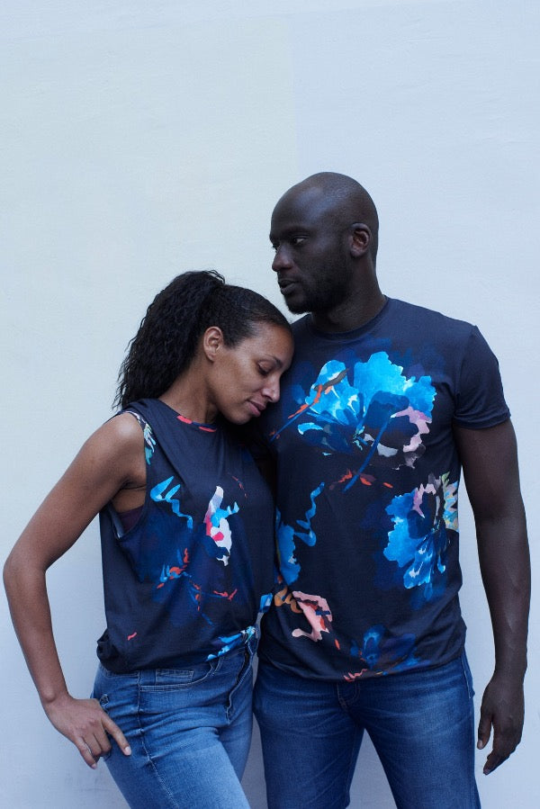 Couple wearing the Take It Easy Honey unisex T-shirts made recycled fabrics. super comfortable fit 